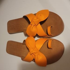 Sandals (Antonio Melani) orange, bow, worn once. In brand new condition.